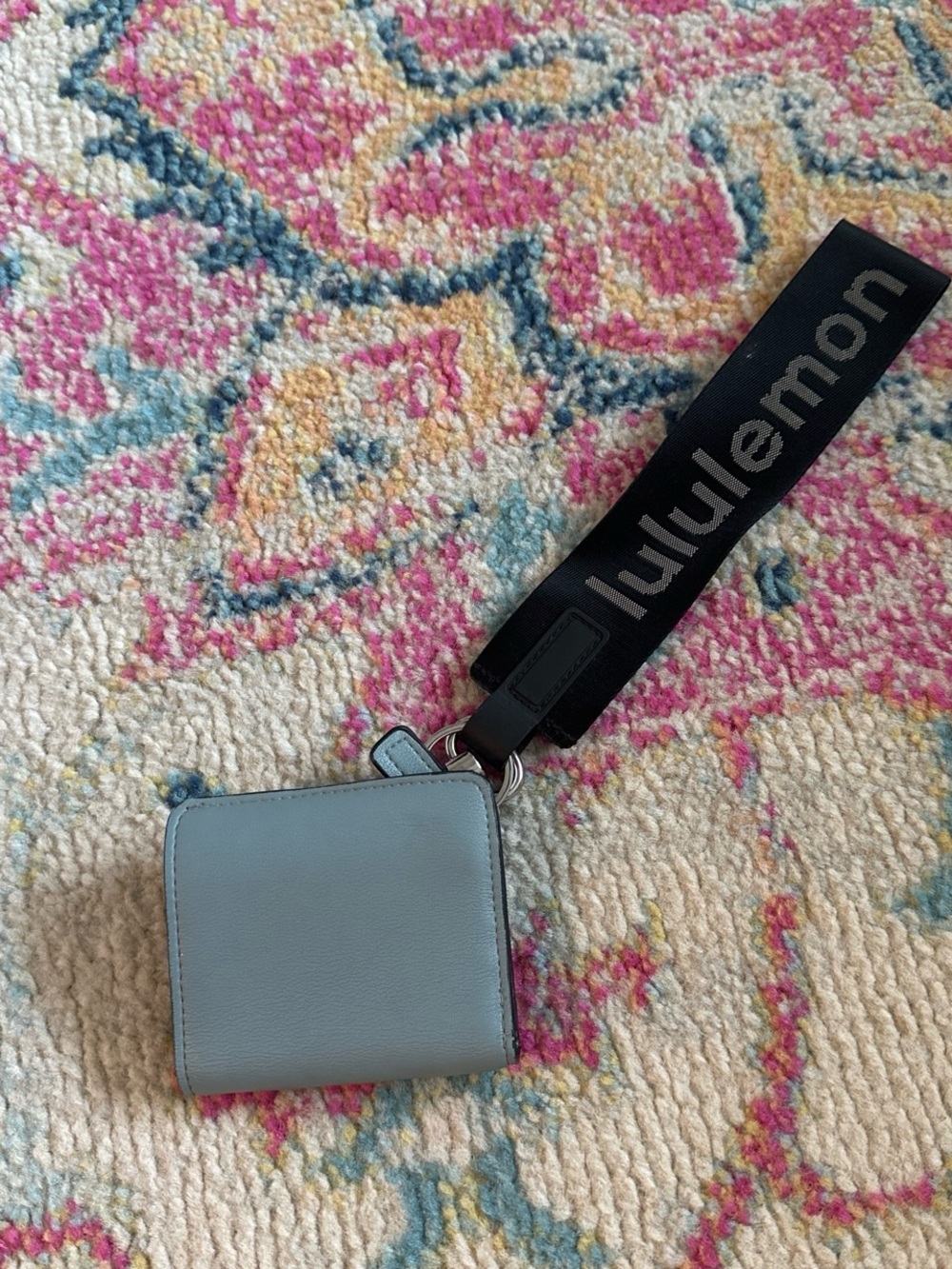 lululemon athletica light blue key/card holder with black strap